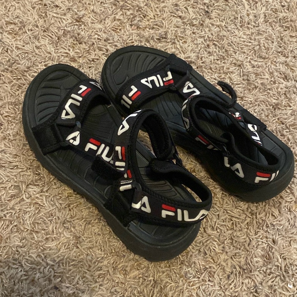 Black Filas sandals